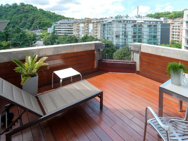 Hotel Silken Amara Plaza : photo 5 de la chambre chambre lits jumeaux confort avec terrasse
