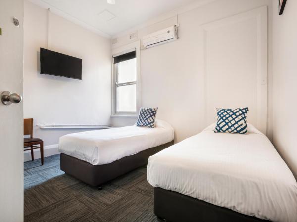 Melton Hotel Auburn : photo 1 de la chambre economy twin room with shared bathroom