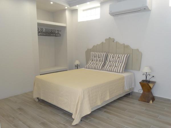 Anassa Suites : photo 4 de la chambre appartement rez-de-chaussée