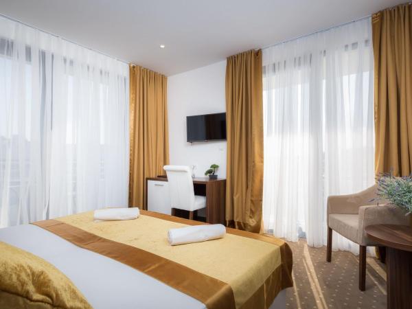 Hotel Perla : photo 2 de la chambre chambre double ou lits jumeaux confort avec balcon