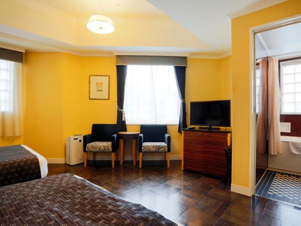 Hotel Monterey La Soeur Fukuoka : photo 1 de la chambre chambre lits jumeaux d'angle - non-fumeurs