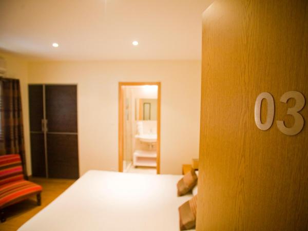 Hotel Cesario : photo 8 de la chambre chambre double confort - vue sur montagne ou jardin