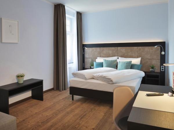 UHU Gästehaus Superior : photo 1 de la chambre chambre double Économique