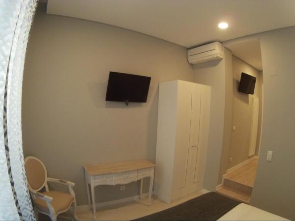 Pensao Estacao Central : photo 8 de la chambre chambre triple supérieure