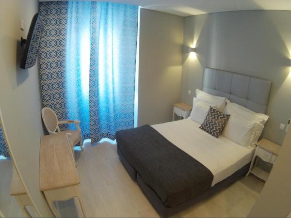 Pensao Estacao Central : photo 10 de la chambre chambre triple supérieure