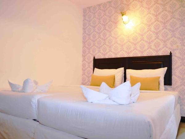 Erawan House : photo 5 de la chambre chambre lits jumeaux standard