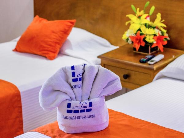 Hotel Hacienda de Vallarta Centro : photo 5 de la chambre chambre quadruple avec kitchenette et climatisation