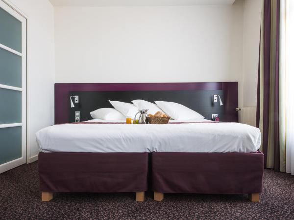 Mercure Lille Roubaix Grand Hôtel : photo 4 de la chambre suite avec 1 lit double et 1 canapé-lit