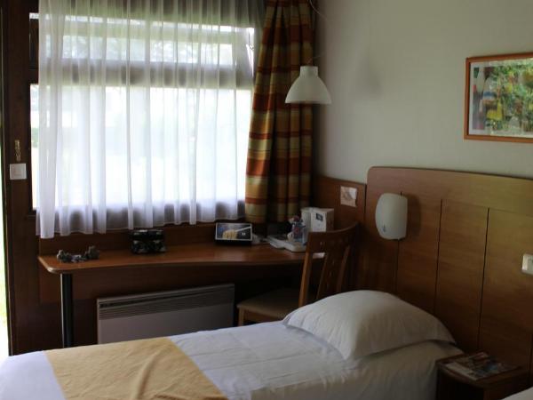 Kyriad Reims Est - Parc Expositions : photo 2 de la chambre chambre lits jumeaux