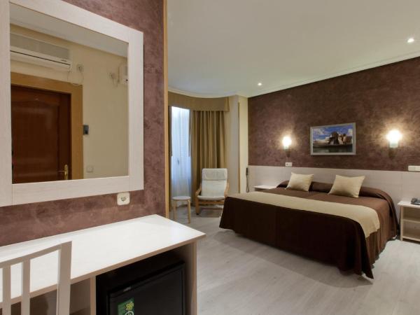 Hotel Mediodia : photo 4 de la chambre chambre double ou lits jumeaux