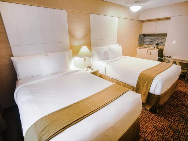 Ocean Beach Club : photo 3 de la chambre chambre de luxe avec 2 lits et kitchenette