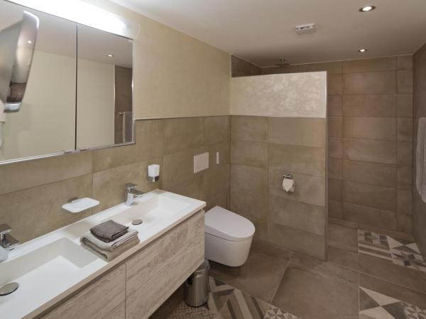 Boutique Hotel Albergo Brione : photo 4 de la chambre chambre double deluxe - vue sur jardin