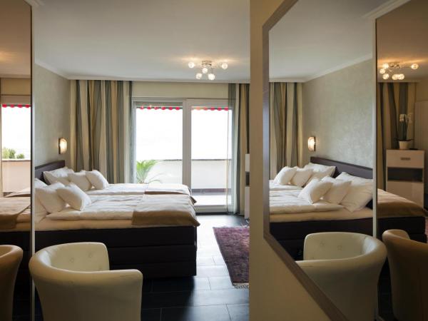 Boutique Hotel Albergo Brione : photo 1 de la chambre suite junior avec balcon