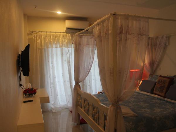 Huen Chan Thip : photo 2 de la chambre chambre double deluxe avec balcon