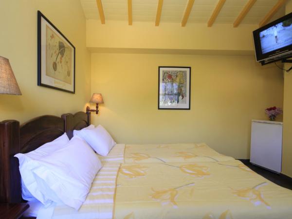 Pousada Repouso do Guerreiro : photo 1 de la chambre chambre double - vue sur jardin