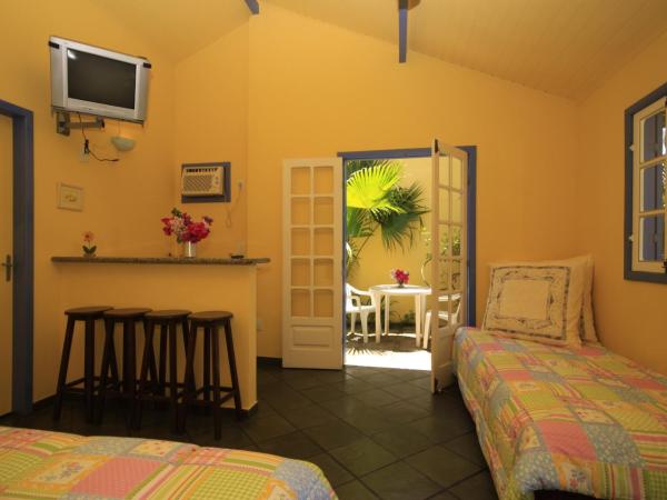 Pousada Repouso do Guerreiro : photo 4 de la chambre appartement avec patio