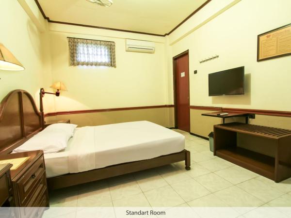 Duta Guest House : photo 1 de la chambre chambre double ou lits jumeaux standard