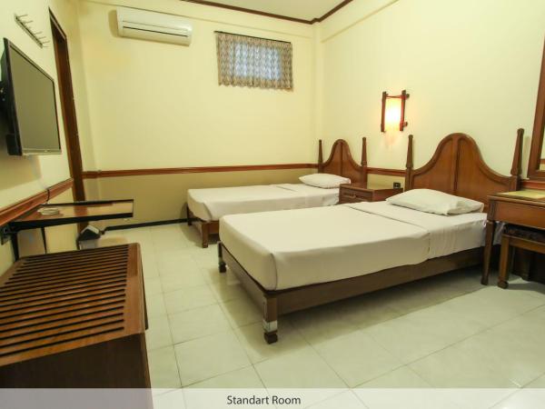 Duta Guest House : photo 2 de la chambre chambre double ou lits jumeaux standard