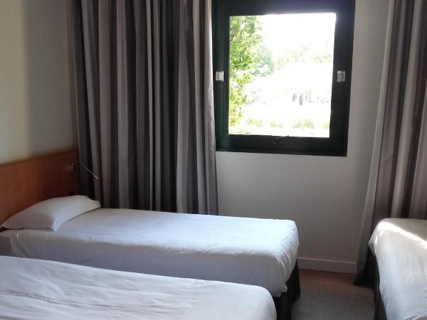 Hôtel Vert : photo 6 de la chambre chambre triple - 3 lits simples