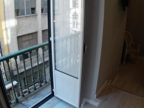 Pensao Estacao Central : photo 5 de la chambre chambre double confort avec balcon
