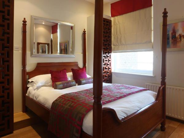 Mayflower Hotel : photo 1 de la chambre chambre double de luxe avec lit à baldaquin