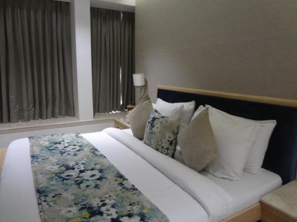 Hotel Suncity Apollo, Colaba : photo 9 de la chambre chambre deluxe double ou lits jumeaux