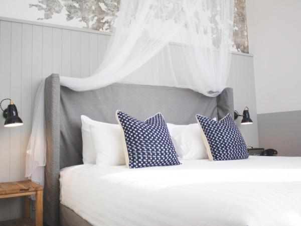 Hotel Palisade : photo 5 de la chambre  suite 1 chambre lit king-size noel banfield