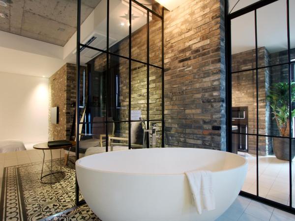 Boutique Hotel Loft : photo 7 de la chambre suite supérieure avec baignoire spa
