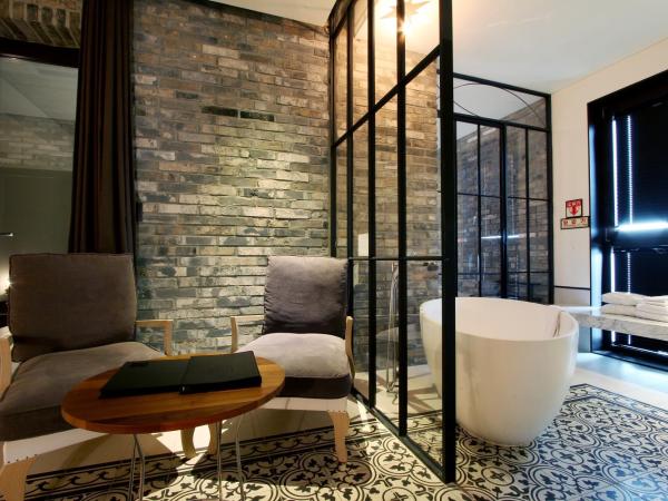 Boutique Hotel Loft : photo 8 de la chambre suite supérieure avec baignoire spa