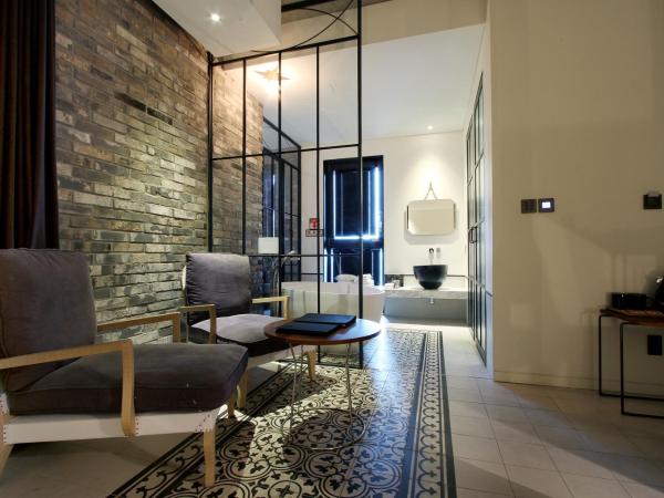 Boutique Hotel Loft : photo 9 de la chambre suite supérieure avec baignoire spa