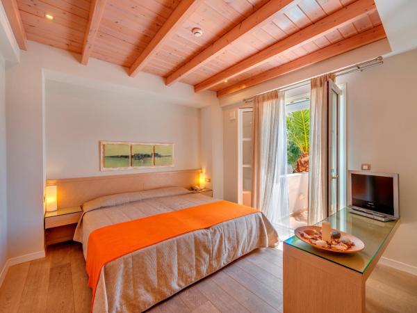 Nissaki Beach Hotel : photo 1 de la chambre chambre double ou lits jumeaux