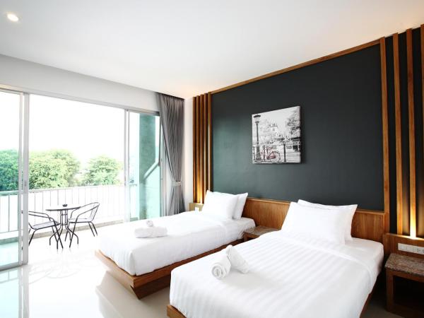 The Malika Hotel - SHA Extra Plus : photo 7 de la chambre chambre lits jumeaux - vue sur ville