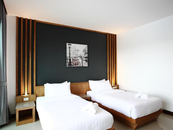 The Malika Hotel - SHA Extra Plus : photo 5 de la chambre chambre lits jumeaux - vue sur ville