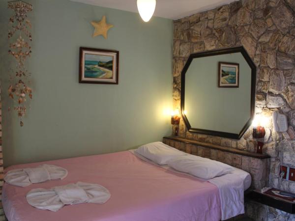 Pousada Flamingo : photo 8 de la chambre chambre supérieure avec balcon