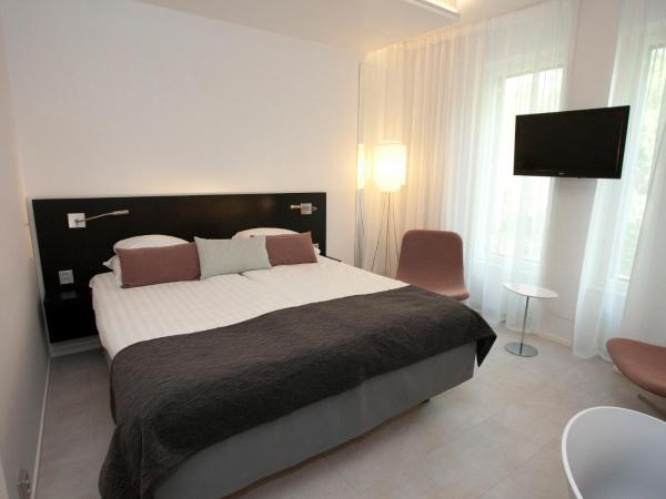 Original Sokos Hotel Puijonsarvi : photo 6 de la chambre chambre lit king-size supérieure avec lit d'appoint