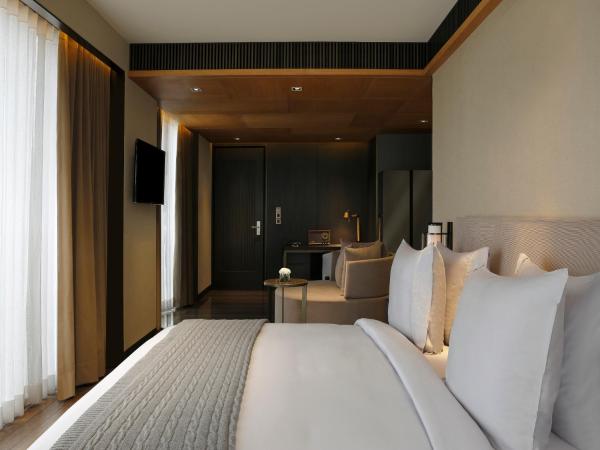 Roseate House New Delhi : photo 3 de la chambre panoramic suite with late check-out  till 2 pm, a bottle of wine and 15% discount on all services