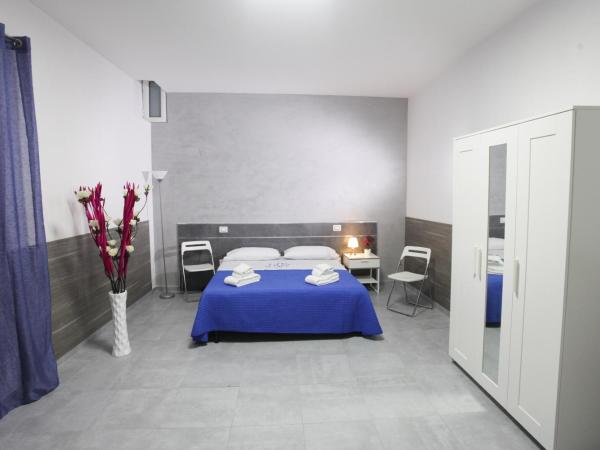 B&B Chiaia Relax : photo 9 de la chambre chambre quadruple confort