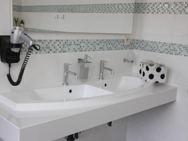 Luxury Suites Arendshof : photo 4 de la chambre suite junior - vue sur jardin