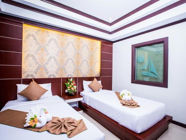 Phi Phi Andaman Beach Resort-SHA Plus : photo 1 de la chambre chambre lits jumeaux deluxe