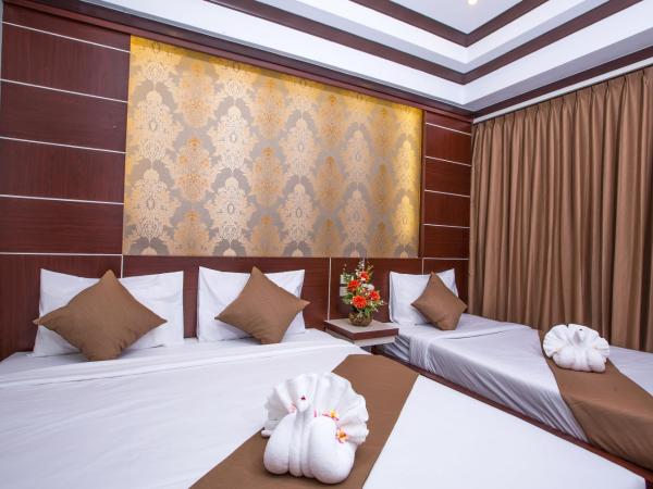 Phi Phi Andaman Beach Resort : photo 3 de la chambre chambre triple deluxe