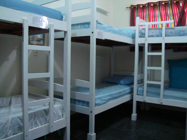 Chale Mineiro Hostel & Pousada : photo 6 de la chambre bunk bed in male dormitory room with shared external bathroom