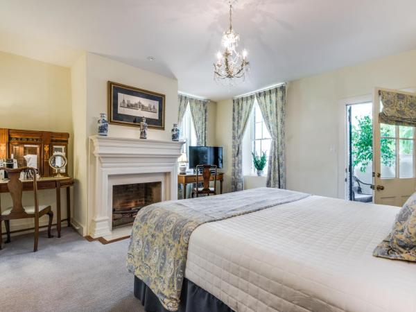 Noble Inns : photo 1 de la chambre suite lit king-size avec baignoire spa - maison oge sur le river walk