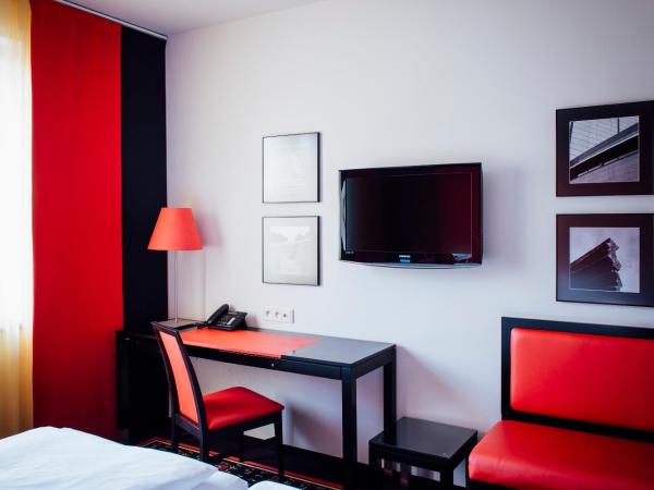 Vienna House Easy by Wyndham Katowice : photo 6 de la chambre chambre accessible