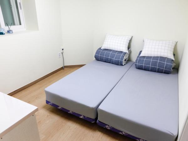 Namsan Gil House : photo 3 de la chambre chambre lits jumeaux
