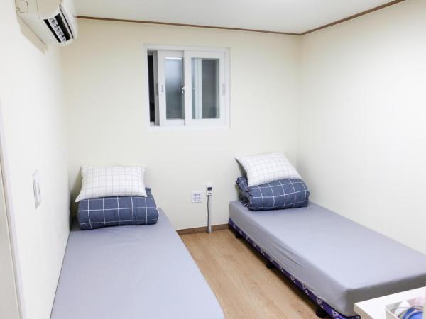 Namsan Gil House : photo 8 de la chambre chambre lits jumeaux