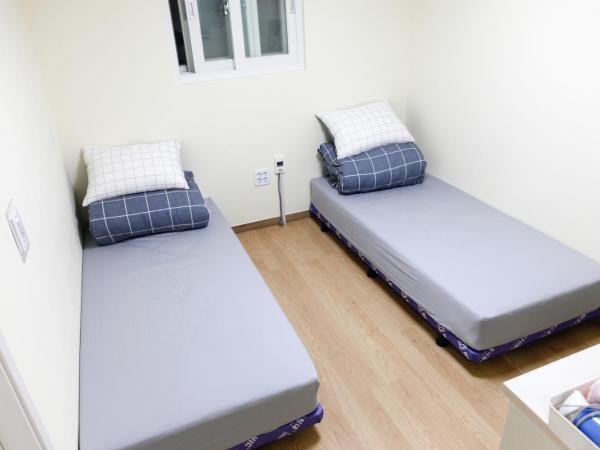 Namsan Gil House : photo 6 de la chambre chambre lits jumeaux