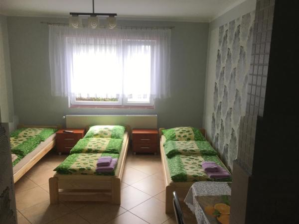 Pod Kasztanem : photo 2 de la chambre chambre triple avec salle de bains privative