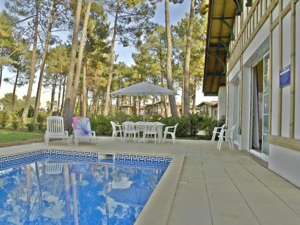 Résidence Odalys Les Greens du Bassin : photo 4 de la chambre villa 4 pièces - 8/10 personnes