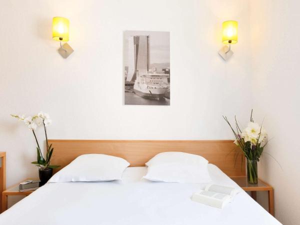 Aparthotel Adagio Access Marseille Prado Périer : photo 2 de la chambre studio avec 1 lit double