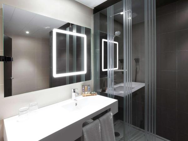 Novotel Madrid Center : photo 2 de la chambre chambre lits jumeaux standard avec canapé